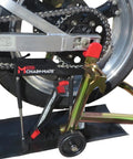 Bike Chain Cleaning And Lubrication Kit With Adjustable Telescopic Rods for chain alignment and maintenance on motorcycle wheel.