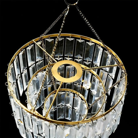 Modern Faux Chandelier Lampshade Featuring A Sleek Gold Frame And Three Tier Faceted Clear Acrylic Beads Ready To Hang For Girls Bedroom Easy Peasy Setup Next Level Bedroom Vibes, close-up of gold frame and clear acrylic.