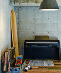 Privia PX 870 88 Key Weighted Console Digital Piano With Tri Sensor II Scaled Hammer Action in a modern room setting.