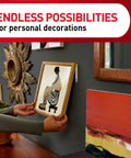 Applying picture using Clear Variety Pack For Damage Free Hanging With Eight Pairs Of Picture Hangers, ideal for home decor.
