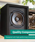 Black wood powered bookshelf speaker with built-in amplifier and 3-inch drivers for turntables, TV, PC, and wireless streaming.