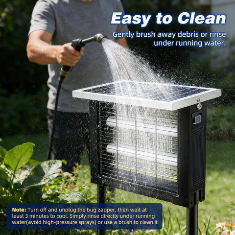 Outdoor Solar Mosquito Zapper Portable With 13 Ft Extension Cord being rinsed with water in a garden setting