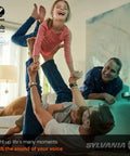 Family playing indoors with Smart Color Changing A19 LED Bulb With Tunable White, ZigBee Enabled, 16 Million Colors in background.