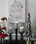 Flickering Flameless LED Battery Candles Set Of Three With Remote Control Unscented Black And White Checkered Large Square Pillars Wax Coated Look Safe Soot Free Home Decor For Tables Events And Cozy Evenings displayed on a mantel with holiday decor
