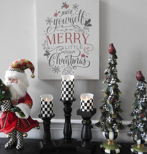Flickering Flameless LED Battery Candles Set Of Three With Remote Control Unscented Black And White Checkered Large Square Pillars Wax Coated Look Safe Soot Free Home Decor For Tables Events And Cozy Evenings displayed on a mantel with holiday decor