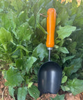 12.6-Inch Garden Hand Trowel with Wooden Handle and Rust-Resistant Steel Head in vegetable garden for transplanting and weeding