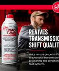 Automatic Transmission Fluid Treatment Scrapes Gritty Sludge To Keep Shifts Snappy And Smooth While Safely Dissolving Hardened Varnish Buildup From Valve Bodies In 16 Oz Bottle, showing a 16 oz bottle of fluid with a mechanic in the background.