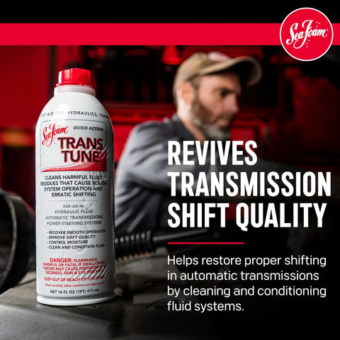 Automatic Transmission Fluid Treatment Scrapes Gritty Sludge To Keep Shifts Snappy And Smooth While Safely Dissolving Hardened Varnish Buildup From Valve Bodies In 16 Oz Bottle, showing a 16 oz bottle of fluid with a mechanic in the background.