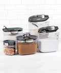 Clear Plastic Airtight Food Storage Canister Set For Flour And Sugar With Magnetic Accessories on countertop, Grey 9 Piece