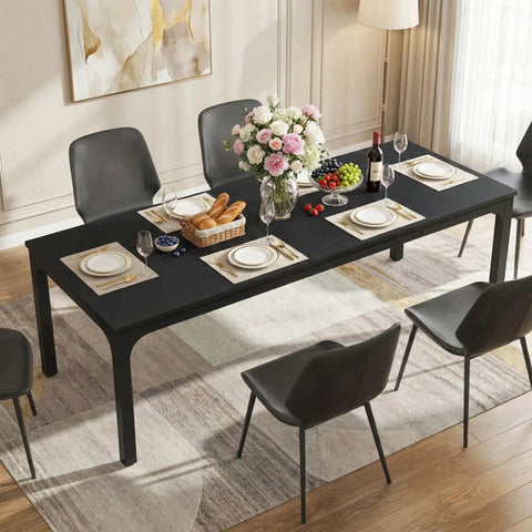 Extra Long Dining Table With Badass Steel Legs, Rectangle Kitchen Table And Dinner Spot, modern black wood top, set for six with plates and flowers.