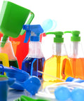 Measure And Pour Water Play Kit For Kids 34 Piece Preschool Science Set with colorful jugs, spray bottles, and utensils on table