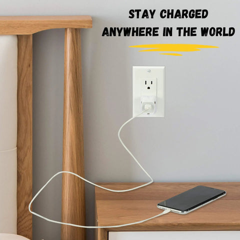 2 Pack Universal Travel Plug Adapter converts EU UK AU Asia plugs to US outlet, shown in use with a smartphone on a wooden nightstand.