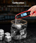 Instant Read Digital Meat Thermometer With Dual Probes For Grilling And Cooking shown submerged in ice water for calibration