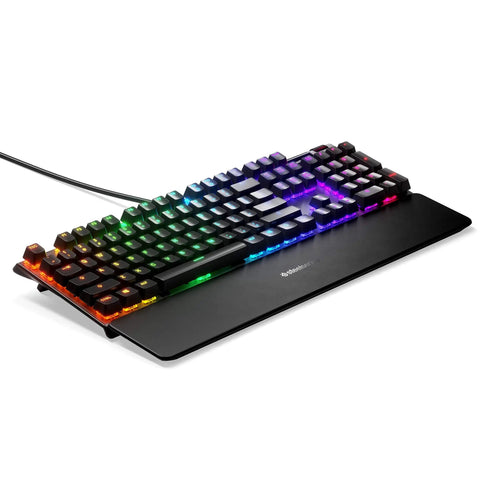 Top Tier Mechanical Gaming Keyboard Featuring Integrated OLED Display USB Passthrough Media Controls Heavy Duty Aluminum Housing Tactile Clicky Blue Switches Full Spectrum RGB Lighting For Gamers Ready To Level Up Their Daily Rig, angled view with colorful RGB backlighting.