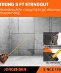 Straight Fire 2 In 1 Laser Tape Measure With 135 Ft Beam Range And 16 Ft Steel Ruler For Slick Layouts Digital Feet Inches Meters Switch Brings Zero Hassle Accuracy For Hard Workin Pros And Weekend Builders Working On Site, shown extended for measuring.