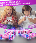 Kids playing with 2.4GHz Gesture Sensing RC Stunt Car With Hand Control And Remote, featuring pink lights and 360° rotation.