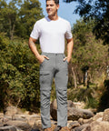 Model wearing Men's Hiking Convertible Pants Zip Off for Outdoor Adventure Water Resistant Quick Dry Lightweight in Light Grey 38W X 34L