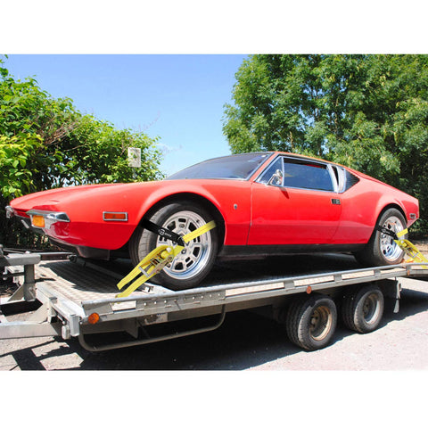 Heavy Duty Car Tie Down Straps For Trailers 2 Inch By 12 Foot, 10000 Lbs Break Strength securing red car on trailer