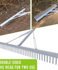 Close-up of 36 Inch Aluminum Landscape Rake For Lawn Care And Garden Work showing double-sided rake head in use