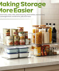 Clear Plastic Stackable Fridge Storage Bins 8 Pack Pantry Organization Cubes For Grocery Management And Fresh Food Keepers stacked with canned goods and food containers on a kitchen countertop.