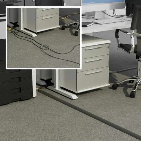 No Sweat Six Foot Floor Cable Cover And Wire Protector Channel in office setting, flexible PVC builds hiding cords on carpet.