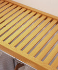 Close-up of the slatted shelf on Heavy Duty Solid Wood Closet Organizer System With Six Deep Drawers And Extended Hanging Rods Wall Mounted Honey Maple Finish.