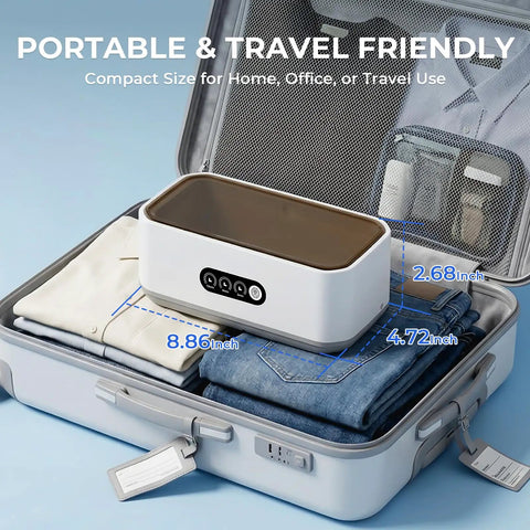 Top Shelf 49Khz Ultrasonic Cleaner With Roomy 650Ml Stainless Steel Tank and Digital Timer in a suitcase with clothes.