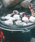 Pre Seasoned 2 Qt Cast Iron Dutch Oven With Flat Bottom For Stovetop And Campfire Use with lid retaining moisture on open flames