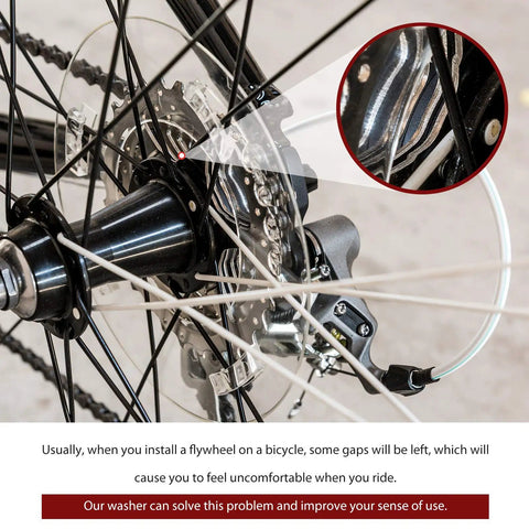 Close-up of a bike's rear hub showing 20 Piece Bike Bottom Bracket Spacer Set With 1mm To 3mm Shims For 7 To 11 Speed Freehub Cassette