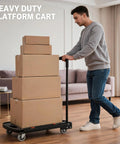 Heavy Duty Folding Platform Cart With Four 360 Degree Swivel Wheels 330 Lb Capacity Non Slip Deck Collapsible Handle For Easy Storage A Real Workhorse For Warehouse Or Home Use with stacked boxes indoors