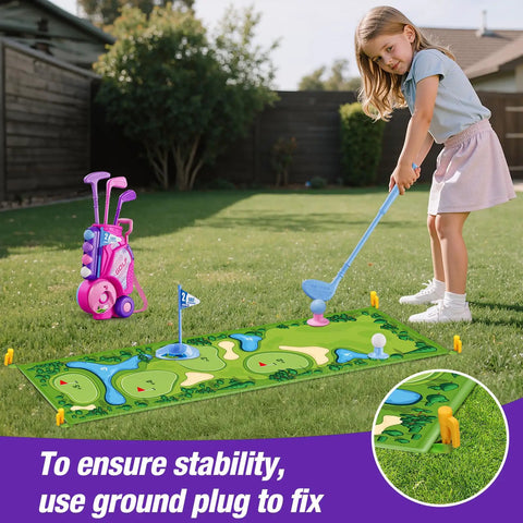 Toddler playing golf with Toddler Golf Set For Kids Ages 2 To 5 With 4 Plastic Clubs, 8 Soft Balls, Putting Mat and Pink Golf Cart Toy