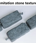 Realistic Faux Stone Landscape Edging Kit With 24 Bricks, 15.5 Ft Total, Lawn And Flower Bed Border Blocks close-up.