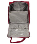 Interior of red underseat carry on luggage with wheels, large main compartment, slip pockets, and zippered clear pocket.