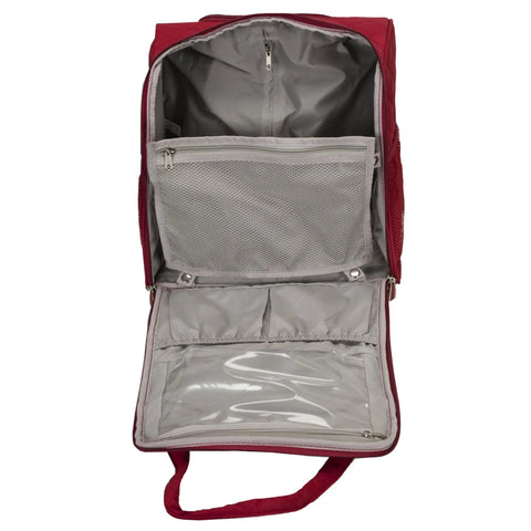 Interior of red underseat carry on luggage with wheels, large main compartment, slip pockets, and zippered clear pocket.