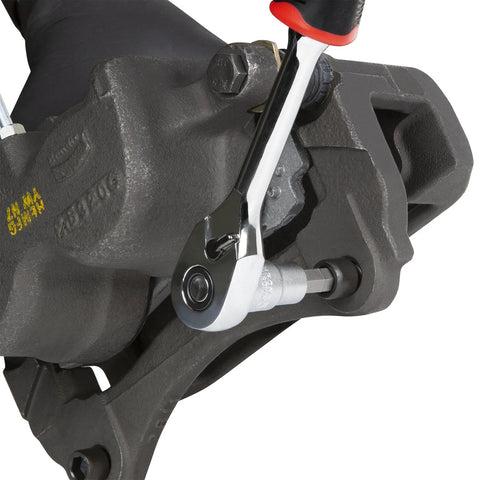 Performance Tool W1336 brake caliper hex bit set on a gray automotive brake caliper with a ratchet handle.