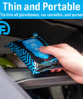 Travel Size Car Interior Wipes For Dashboards, Seats, Steering Wheel And Surfaces being stored in a car glovebox