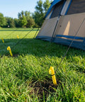 24 Pack 9 Inch Yellow Plastic Tent Pegs Stakes For Camping And Outdoor Use Durable Lightweight PP Stakes securing tent on grass