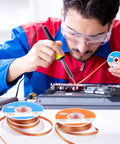 Technician using No Clean Solder Braided Wick Set for easy desoldering; 3-pack wicks on display; 0.1 and 0.08 inch widths, 1.5m length each, copper