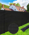 Privacy Screen For Fences 6 Ft By 50 Ft Heavy Duty Shade Cover With Brass Grommets Black Outdoor Back Yard Customizable Weather Resistant HDPE For Superior Privacy And UV Sun Shield Built Tough To Last installed in backyard.