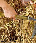 Using Durable Hand Weeder Sickle Tool with hardwood handle for weeding, soil loosening, and cultivation in tight spaces.