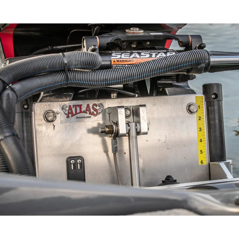 Outboard motor mounted using Heavy Duty Marine Jack Plate Bolt Kit with stainless bolts, lock nuts, and washers on boat.