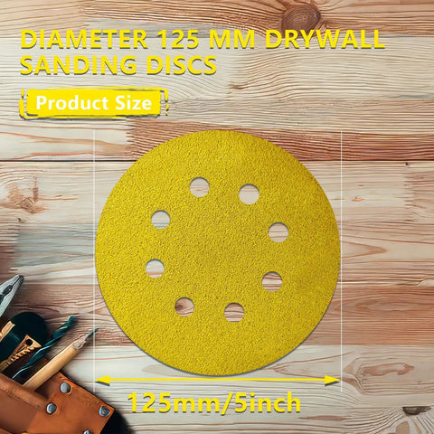 135 Piece 5 Inch Sanding Discs Set Eight Hole Round Hook And Loop Gold Pro Grade Grit on wooden background with tools