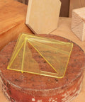 Savannah Center Finder woodworking centering tool, yellow translucent plastic for 8-inch round, square, octagon and hex stock.
