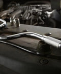Beefy Three Eighths Inch Drive Speeder Handle, 16.75 Inch Length on car engine, chrome finish, showing ball detent end