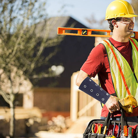 Kick Ass Cut Resistant Wrist Sleeves Breathable Lightweight Arm Guards on worker during construction, protecting arms.