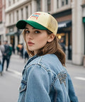 Woman wearing Lightweight Womens Sports Trucker Cap With Low Profile Front And Airy Mesh Ventilation Eyelets walking in city