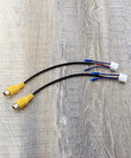 Close-up of two Four Pack 10Pin Car Reversing Camera Cable Adapter For Large Screen Rear View Wiring Harness with yellow connectors.