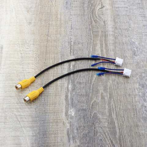 Close-up of two Four Pack 10Pin Car Reversing Camera Cable Adapter For Large Screen Rear View Wiring Harness with yellow connectors.