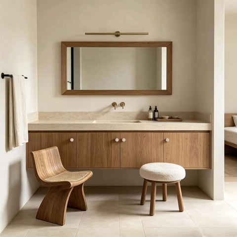 Modern bathroom with wooden cabinet, round mirror, and natural stone countertop showcasing elegance and functionality.
