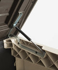 Detailed view of the hinge mechanism inside the All Weather Heavy Duty Outdoor Storage Shed Made From Resin Plastic For Forty Two Cubic Feet Of Easy Patio Garden Tool Organization In Earthy Brown Shade.